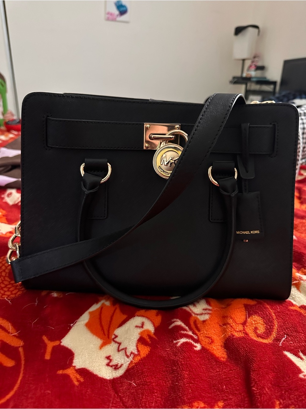 Michael Kors Black Leather Satchel with Gold Accents